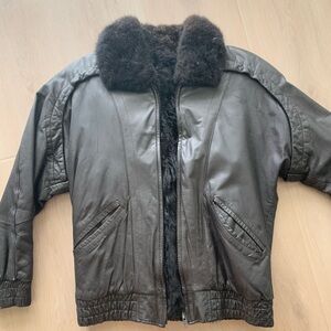 Real Leather Jacket from NYC. Has heavy fur lining. Size Medium.